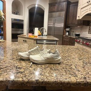 Women’s New Balance white tennis shoes